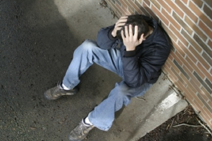 Photo of Man in Crisis